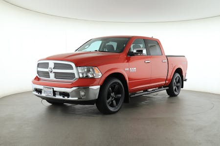 Red 2018 Ram 1500 with 31.9k miles and stock number: c182209